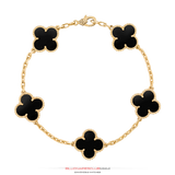 This piece is handcrafted and manufactured by BillionairesClub.Miami All of the Bracelets are handmade by a in-house master in the highest quality craftsmanship. This piece is made of solid gold. Dimensions: Clover: 7mm / Distance: 21mm / Bracelet Length: 6+1inch (chain Extender)