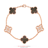 This piece is handcrafted and manufactured by BillionairesClub.Miami All of the Bracelets are handmade by a in-house master in the highest quality craftsmanship. This piece is made of solid gold. Dimensions: Clover: 7mm / Distance: 21mm / Bracelet Length: 6+1inch (chain Extender)