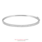 All of the VS diamonds are hand-set by a master diamond setter in the highest quality craftsmanship. This piece is made of solid gold. Our handcrafted Gold Double Row Diamond Bangle contain famous designs seen on various entertainers and celebrities around the world.